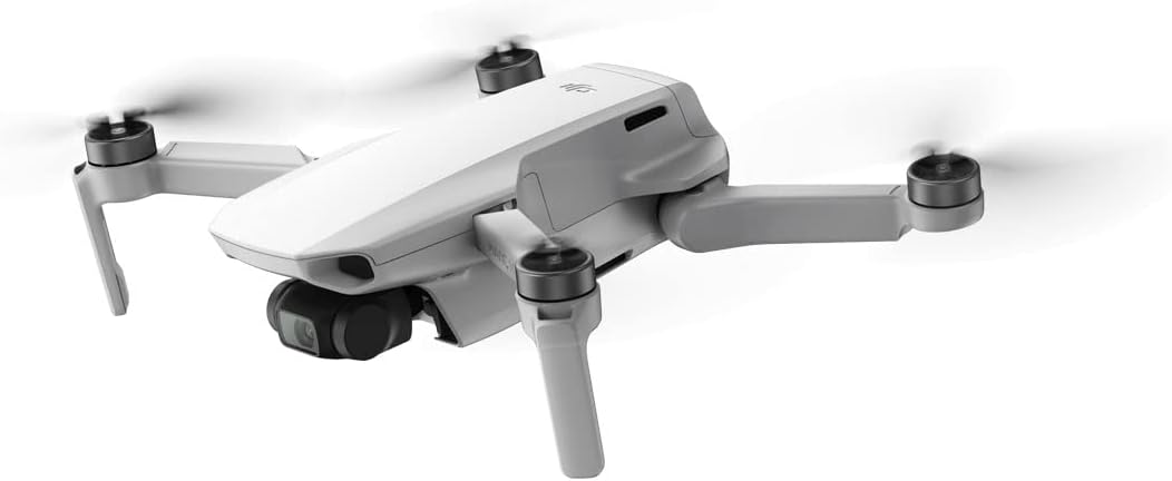 DJI Mavic Mini - Ultralight and Portable Drone, Battery Life 30 Minutes, Transmission Distance 4 KM, 3-Axis Gimbal, 12 MP, HD Video 2.7K, Lightweight, Easy to Edit and Share, QuickShots-0