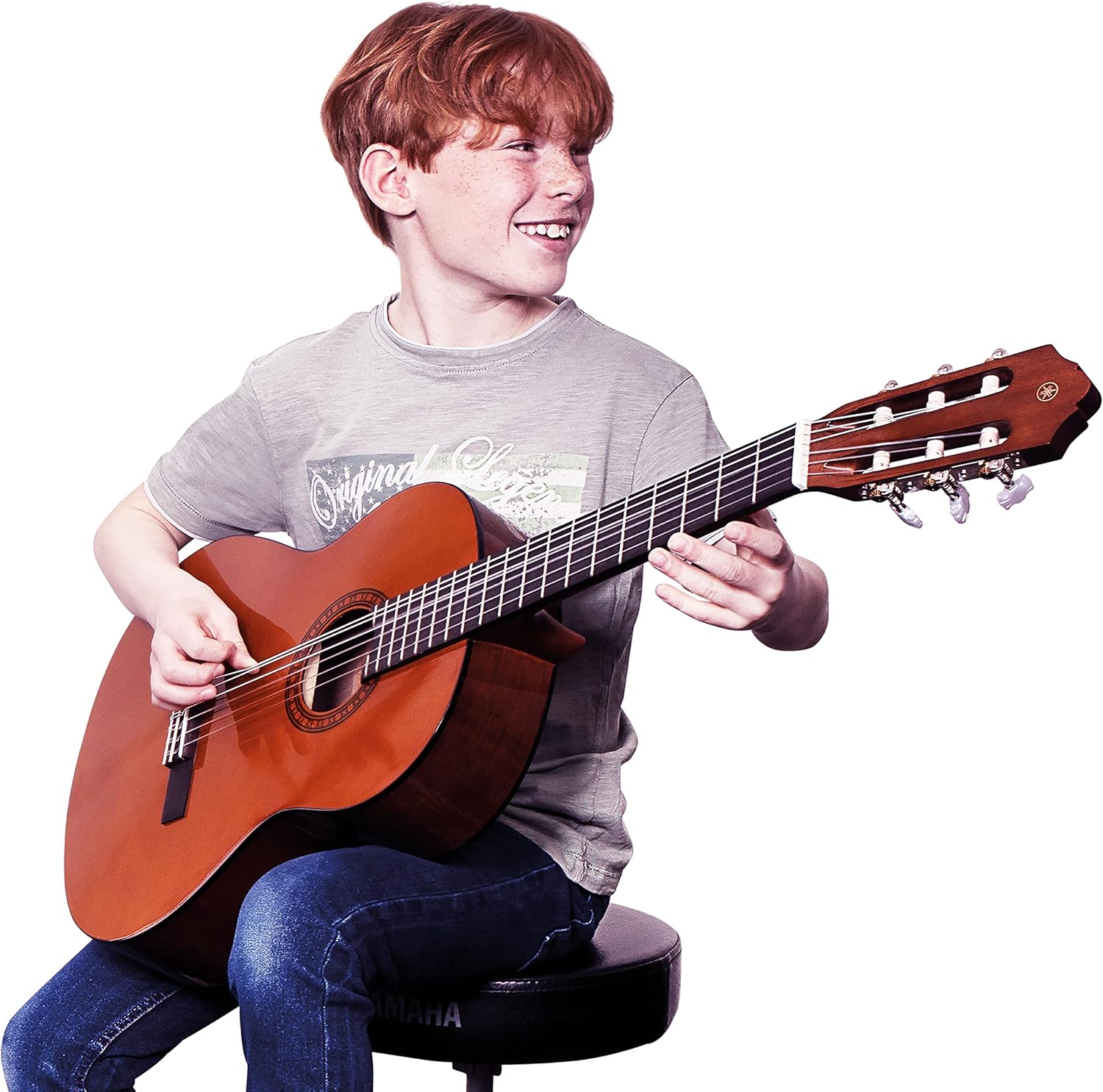 Yamaha GuitarGo - Starter Set Junior - Acoustic guitar pack for young learners including a gig bag, digital tuner for iOS and a footrest-1