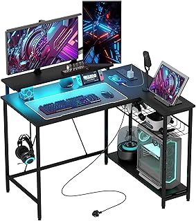 HOMCOM L Shaped Gaming Desk with LED Lights, Power Outlet, USB Charging Ports, 107cm Reversible Corner Computer Desk with Storage Shelves, Monitor Stand for Home Office, Small Space, Black